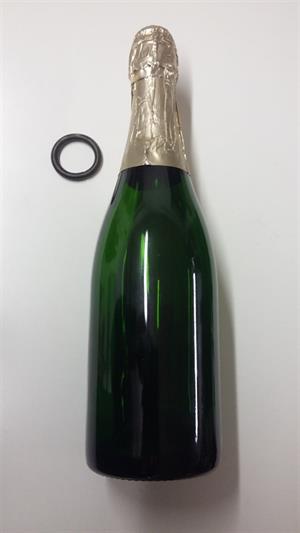 Fjederring til påsætning af aluminiumshætter på champagneflasker